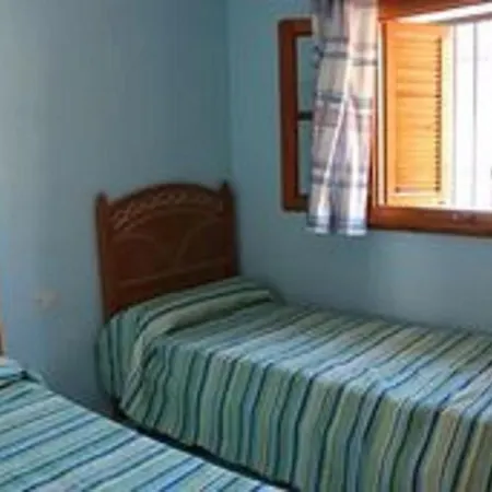 Casa Adelfas, *